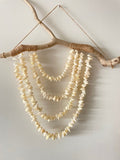 Suspension en coquillages